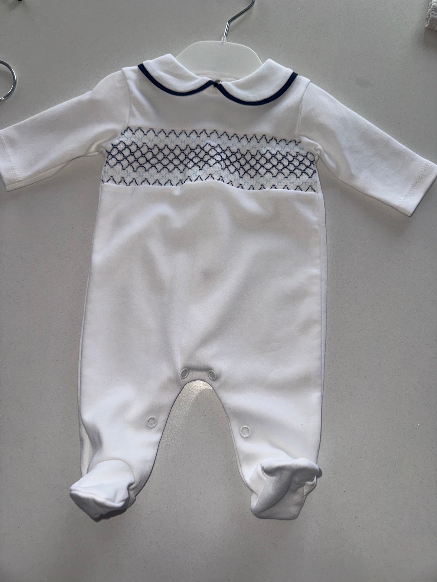 Hugo-White and Blue Smocked Babygrow